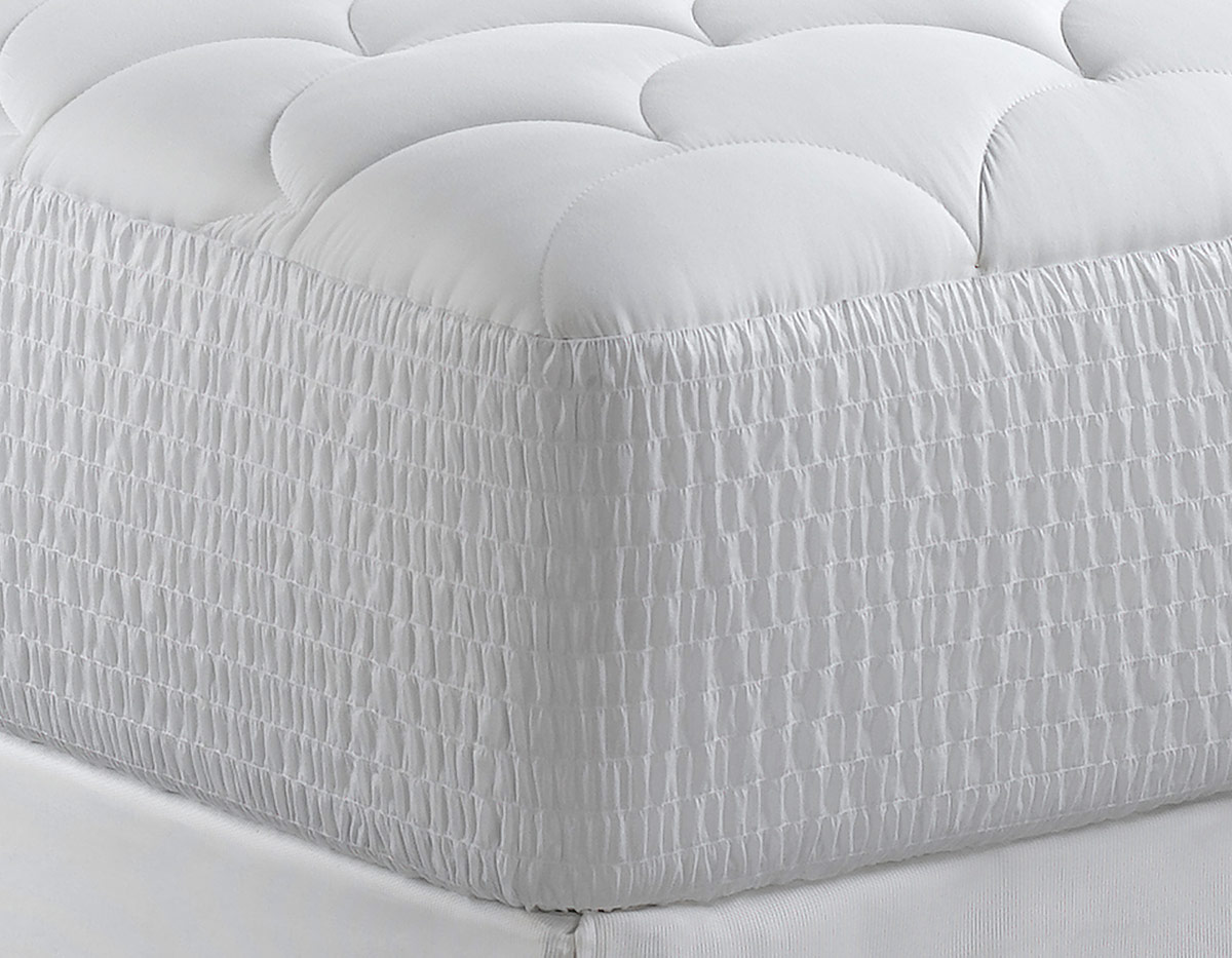 Sleep Like You're in Paris With the Ritz Paris Mattress Topper