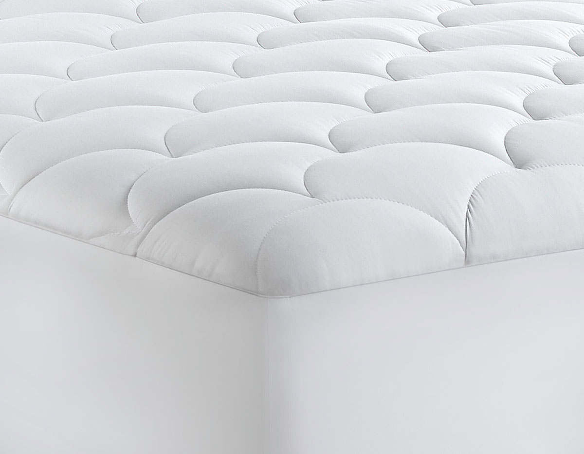 Sleep Like You're in Paris With the Ritz Paris Mattress Topper